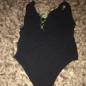 Black bodysuit with neon strings